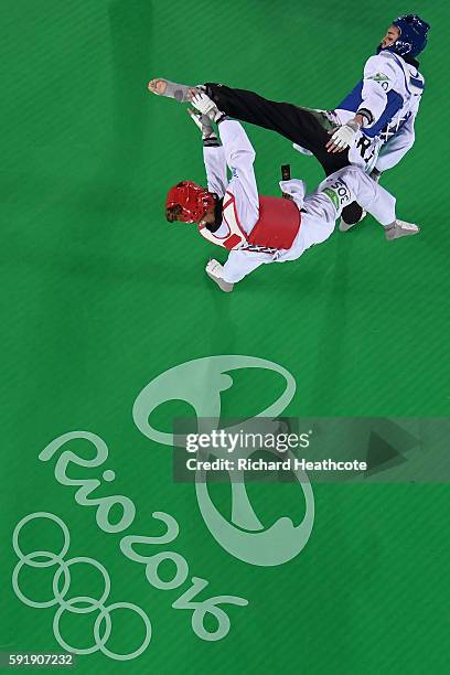 Nikita Glasnovic of Sweden competes against Kimia Alizadeh Zenoorin of the Islamic Republic of Iran during the Women's -57kg Bronze Medal Taekwondo...