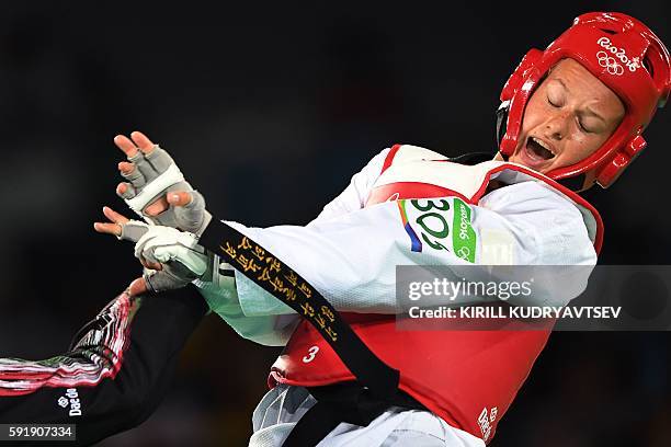 Sweden's Nikita Glasnovic competes against Iran's Kimia Alizadeh Zenoorin during their womens taekwondo bronze medal bout in the -57kg category as...
