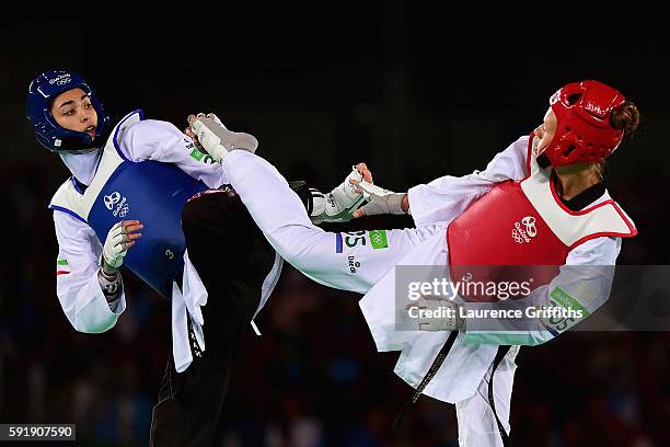 Nikita Glasnovic of Sweden competes against Kimia Alizadeh Zenoorin of the Islamic Republic of Iran during the Women's -57kg Bronze Medal Taekwondo...