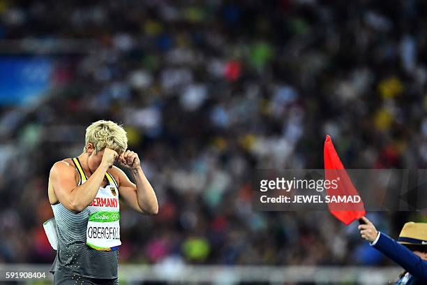 Germany's Christina Obergfoll reacts in the Women's Javelin Throw Final during the athletics event at the Rio 2016 Olympic Games at the Olympic...