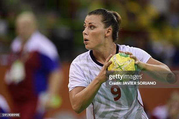 Norway's right back Nora Mork prepares to take a 7-meter throw out during the women's semifinal handball match Norway vs Russia for the Rio 2016...