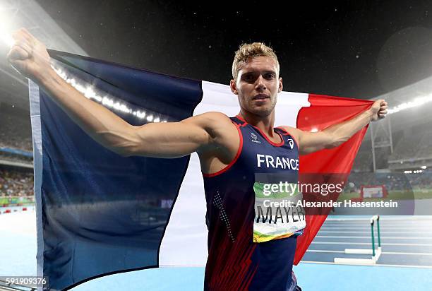 Kevin Mayer of France celebrates after the Men's Decathlon 1500m and winning silver overall on Day 13 of the Rio 2016 Olympic Games at the Olympic...