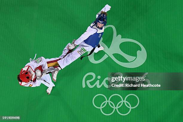 Jade Jones of Great Britain competes against Eva Calvo Gomez of Spain during the Women's -57kg Gold Medal Taekwondo contest at the Carioca Arena on...