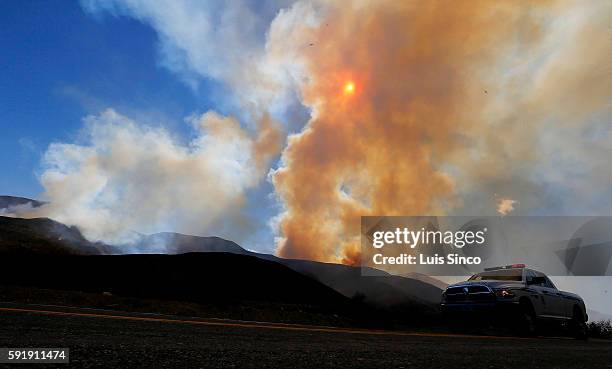 The Blue Cut fire burns in the mountains of the San Bernardino National Forest near Wrightwood on Thursday, Aug. 18, 2016.