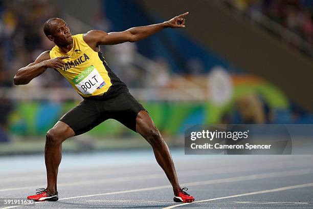 Usain Bolt of Jamaica celebrates winning the Men's 200m Final on Day 13 of the Rio 2016 Olympic Games at the Olympic Stadium on August 18, 2016 in...