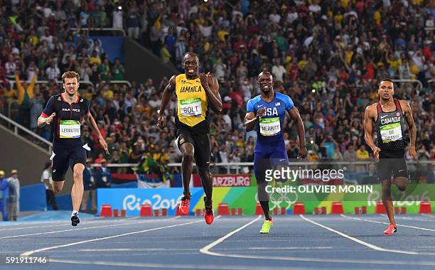 FromL France's Christophe Lemaitre, Jamaica's Usain Bolt, USA's Lashawn Merritt and Canada's Andre De Grasse compete in the Men's 200m Final during...