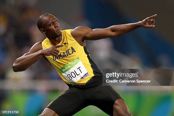 Usain Bolt of Jamaica celebrates winning the Men's 200m Final on Day 13 of the Rio 2016 Olympic Games at the Olympic Stadium on August 18, 2016 in...