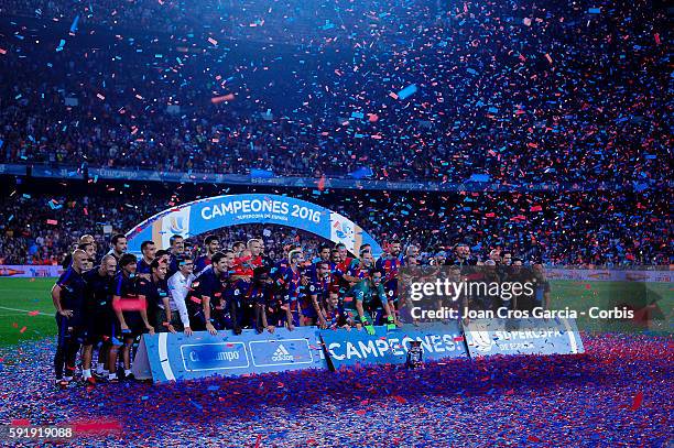 All the F.C.Barcelona players and staff, celebrating the victory, during the F.C.Barcelona vs Sevilla F.C., Spanish Super Cup match, at Nou Camp, on...