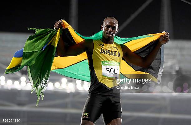 Usain Bolt of Jamaica celebrates winning the Men's 200m Final on Day 13 of the Rio 2016 Olympic Games at the Olympic Stadium on August 18, 2016 in...