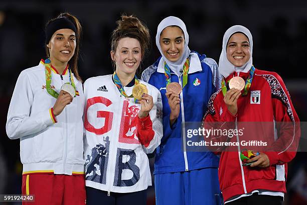 Silver medalist Eva Calvo Gomez of Spain, gold medalist, Jade Jones of Great Britain and bronze medalists Kimia Alizadeh Zenoorin and Hedaya Wahba of...