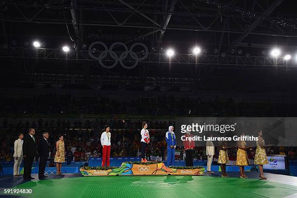 Silver medalist Eva Calvo Gomez of Spain, gold medalist, Jade Jones of Great Britain and bronze medalists Kimia Alizadeh Zenoorin and Hedaya Wahba of...