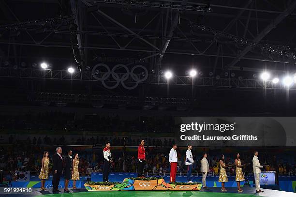 Silver medalist Alexey Denisenko of Russia, gold medalist Ahmad Abughaush of Jordan, Bronze medalists Daehoon Lee of the Republic of Korea and Joel...