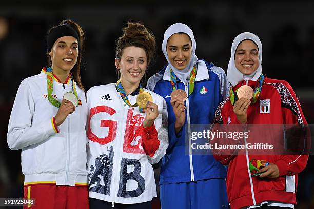 Silver medalist Eva Calvo Gomez of Spain, gold medalist, Jade Jones of Great Britain and bronze medalists Kimia Alizadeh Zenoorin and Hedaya Wahba of...