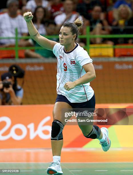 Nora Mork of Norway reacts to a goal during the Women's Handball Semi-final match against Russia at the Future Arena on Day 13 of the 2016 Rio...