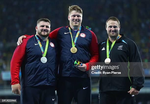 Silver medalist, Joe Kovacs of the United States, gold medalist, Ryan Crouser of the United States, and bronze medalist, Tomas Walsh of New Zealand,...