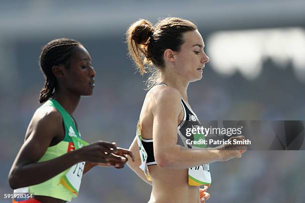 Nikki Hamblin of New Zealand and Senbere Teferi of Ethiopia compete during the Women's 5000m Round 1 on Day 11 of the Rio 2016 Olympic Games at the...