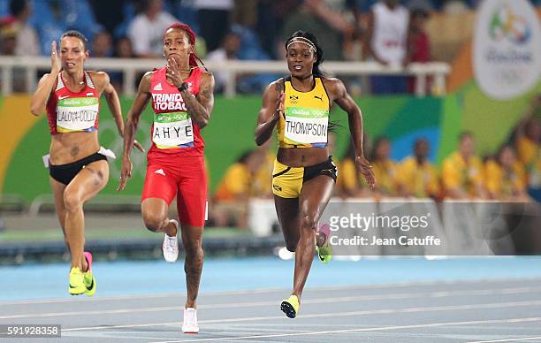 Ivet Lalova-Collio of Bulgaria, Michelle-Lee Ahye of Trinidad and Tobago and Elaine Thompson of Jamaica compete in the Women's 200m final on day 12...