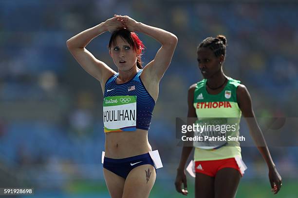 Shelby Houlihan of the United States and Ababel Yeshaneh of Ethiopia are seen during the Women's 5000m Round 1 on Day 11 of the Rio 2016 Olympic...