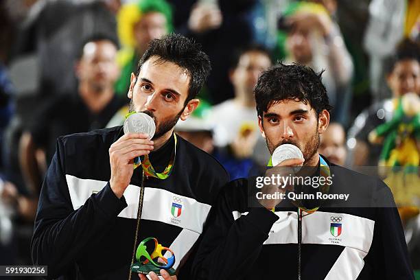 Silver medalists Paolo Nicolai and Daniele Lupo of Italy pose on the podium during the medal ceremony for the Men's Beachvolleyball contest at the...