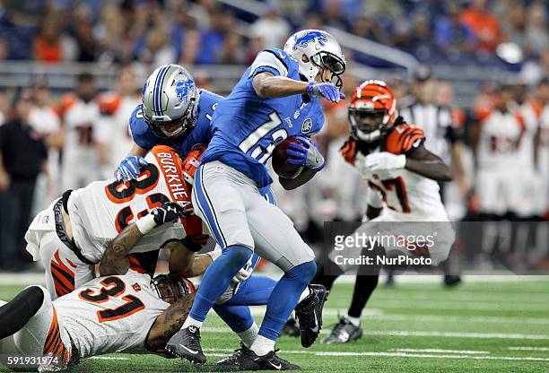 Detroit Lions wide receiver T.J. Jones breaks away from Cincinnati Bengals free safety Derron Smith during the first half of an NFL football game in...