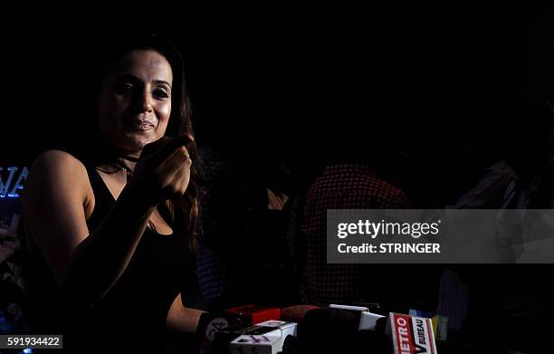 Indian Bollywood actress Ameesha Patel attends the launch of Rebecca Deans new designer label in Mumbai on August 18, 2016. / AFP / STRINGER