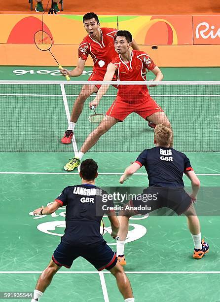 Chai Biao and Hong Wei of China compete against Ellis Marcus and Langridge Chris of Britain in the Mens Doubles Bronze Medal Match on Day 13 of the...