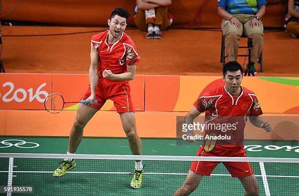 Chai Biao and Hong Wei of China compete against Ellis Marcus and Langridge Chris of Britain in the Mens Doubles Bronze Medal Match on Day 13 of the...