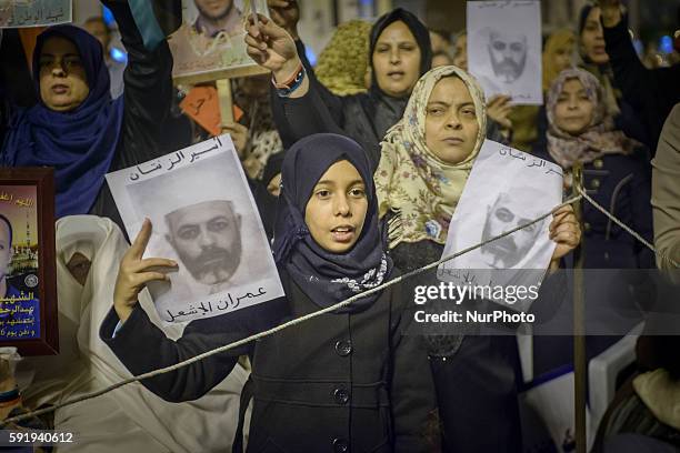 November 21, 2014 - Tripoli, Libya - Fajr-Libya supporters rally in Martyrs' Square. Women who have family members who have died in the ongoing...