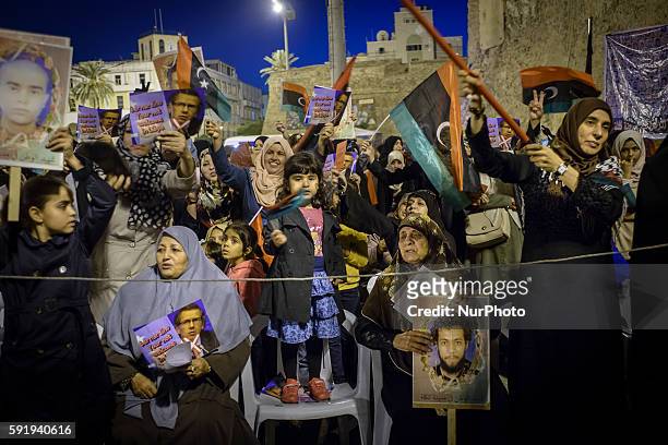 November 21, 2014 - Tripoli, Libya - Fajr-Libya supporters rally in Martyrs' Square. Women who have family members who have died in the ongoing...