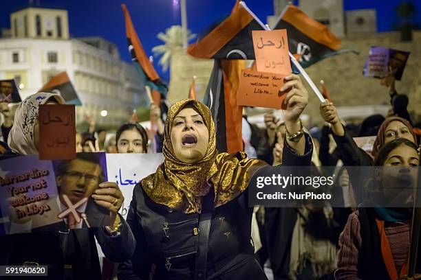 November 21, 2014 - Tripoli, Libya - Fajr-Libya supporters rally in Martyrs' Square. Women who have family members who have died in the ongoing...