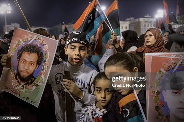 November 21, 2014 - Tripoli, Libya - Fajr-Libya supporters rally in Martyrs' Square. Women who have family members who have died in the ongoing...