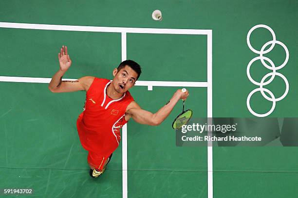 Dan Lin of China competes during the Men's Singles Badminton Semi-final against Chong Wei Lee of Malaysia on Day 14 of the Rio 2016 Olympic Games at...