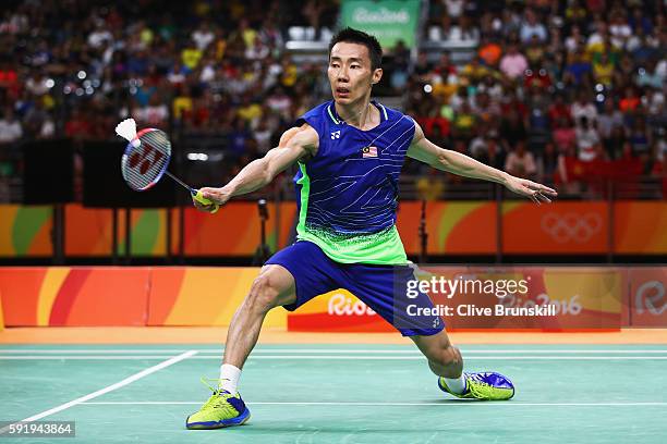 Chong Wei Lee of Malaysia competes against Dan Lin of China during the Men's Singles Badminton Semi-final against on Day 14 of the Rio 2016 Olympic...