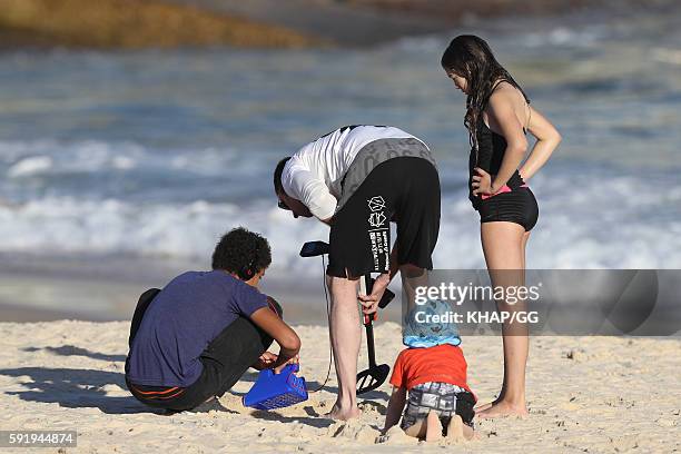 August 16: Hugh Jackman at the beach with son Oscar and daughter, Ava on August 16, 2016 in Sydney, Australia.