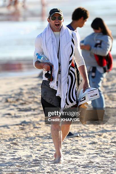 August 16: Hugh Jackman is seen on the beach on August 16, 2016 in Sydney, Australia.