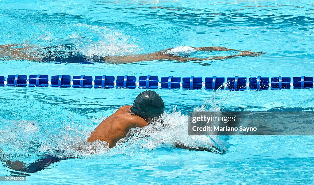 Young swimmers competing in races