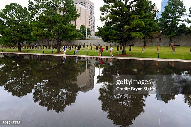 View of the reflecting pool at the Oklahoma City National Memorial & Museum on July 30, 2016. The memorial designed to honor survivors, victims and...