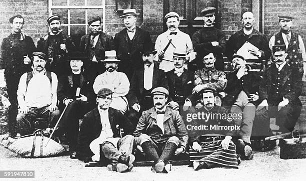 Group of Scotland Yard detectives in various disguises seen here before setting out on a special observation mission which resulted in the important...