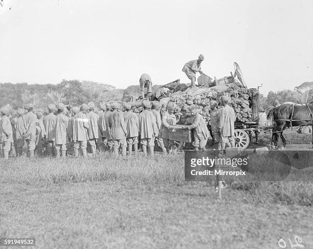 Soldiers of the 3rd Indian Division seen here unloading transport wagons at their rest camp on the race course at Marseilles, France, September 30th...