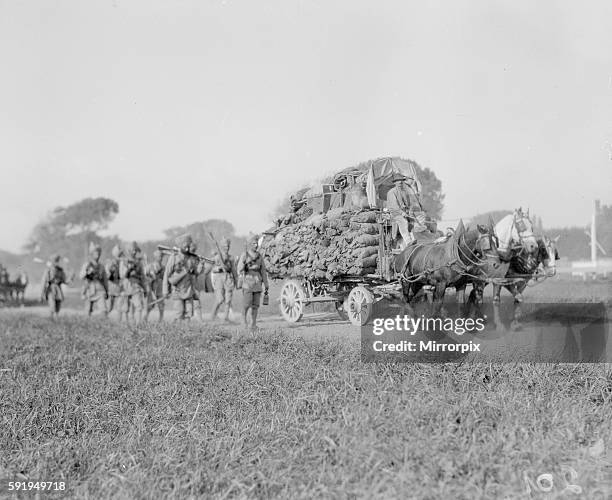 Skih soldiers part of the 3rd Indian Division seen here escorting on of the transports from the docks to their rest camp on the race course at...