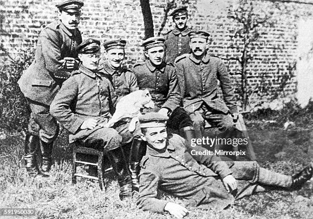 Adolf Hitler far right seen here resting behind the lines at Comines with his comrades from the XVth Bavarian Regiment. Circa March 1915
