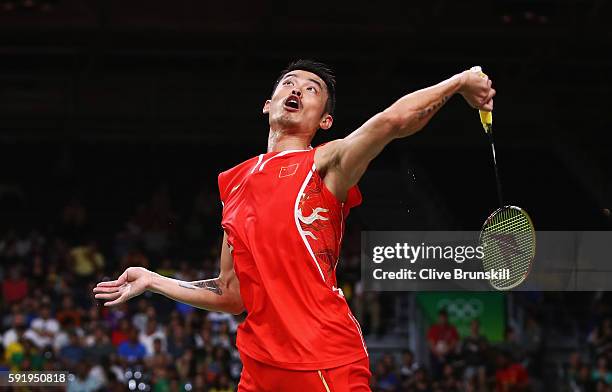 Dan Lin of China competes during the Men's Singles Badminton Semi-final against Chong Wei Lee of Malaysia on Day 14 of the Rio 2016 Olympic Games at...