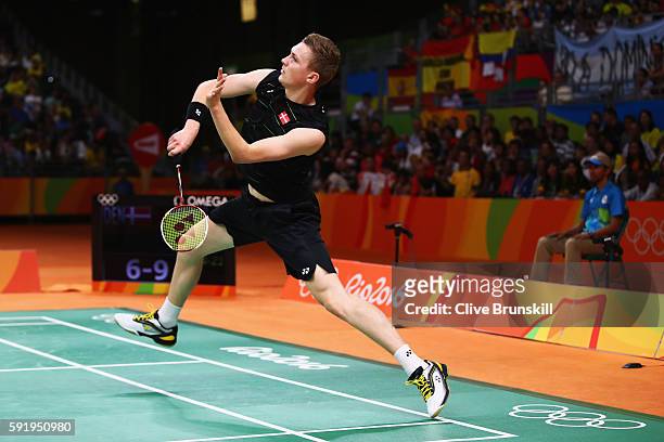 Viktor Axelsen of Denmark competes against Long Chen of China during the Men's Singles Badminton Semi-final on Day 14 of the Rio 2016 Olympic Games...