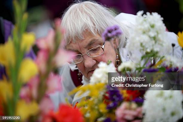 Visitors enjoy the flower displays during the Southport Flower Show on August 19, 2016 in Southport, England. Friday is traditionally 'Ladies Day' at...