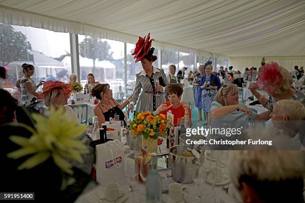 Ladies don their best hats and dresses as they attend the VIP Ladies Day Lunch at Southport Flower Show on August 19, 2016 in Southport, England....