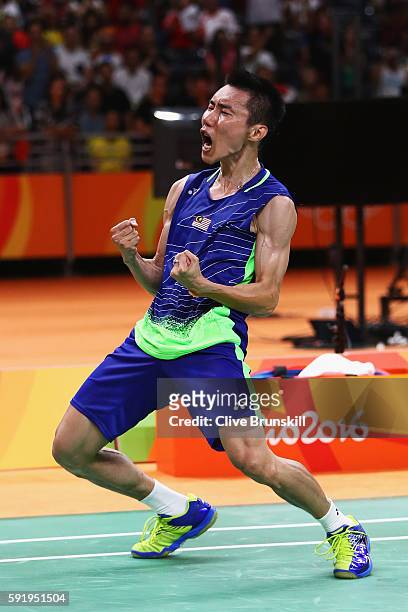 Chong Wei Lee of Malaysia celebrates after defeating Dan Lin of China during the Men's Singles Badminton Semi-final against on Day 14 of the Rio 2016...