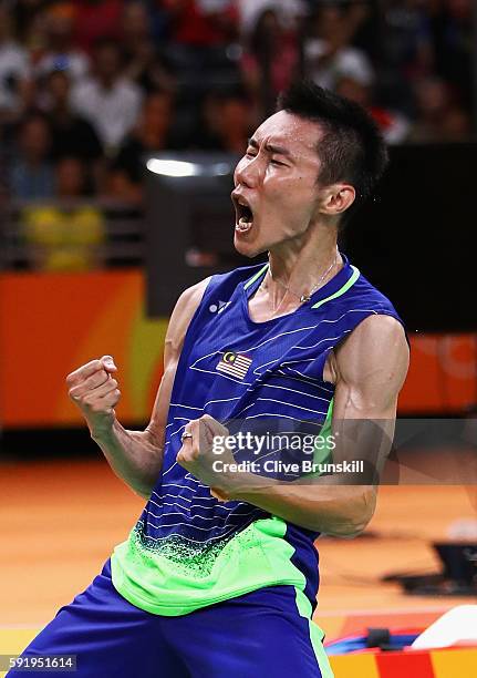 Chong Wei Lee of Malaysia celebrates after defeating Dan Lin of China during the Men's Singles Badminton Semi-final against on Day 14 of the Rio 2016...