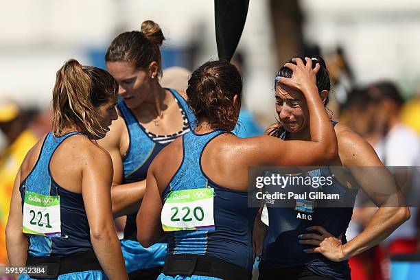 Magdalena Garro, Brenda Rojas, Sabrina Ameghino and Alexandra Keresztesi of Argentina react after the Women's Kayak Four 500m on Day 14 of the Rio...