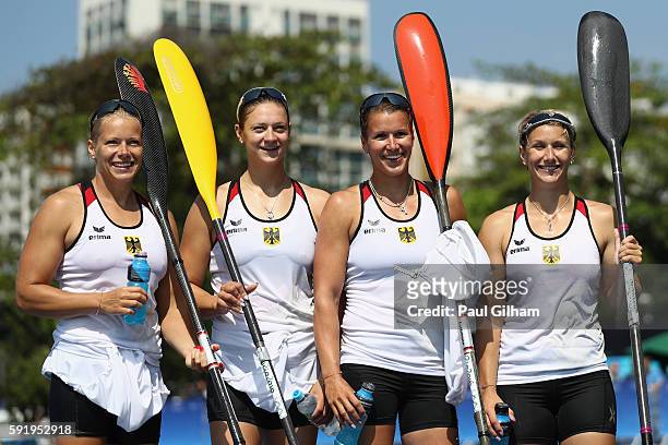 Sabrina Hering, Franziska Weber, Steffi Kriegerstein, and Tina Dietze of Germany pose for a photo following the Women's Kayak Four 500m on Day 14 of...