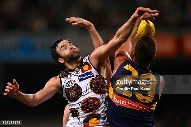 Jordan Lewis of the Hawks and Scott Lycett of the Eagles contest for the ball during the round 22 AFL match between the West Coast Eagles and the...
